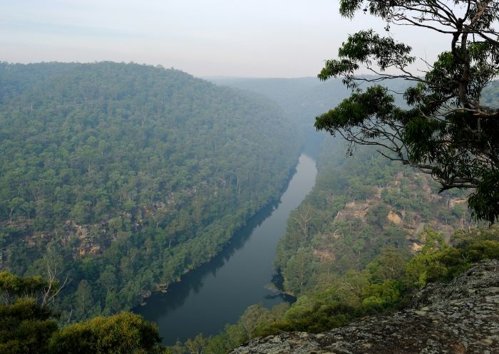 View of Nepean River from unfenced Neapean Lookout, on a hazy day in the Glenbrook area, Blue Mountains National Park