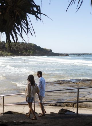 Couple enjoying a day out at Yamba Main Beach, Yamba
